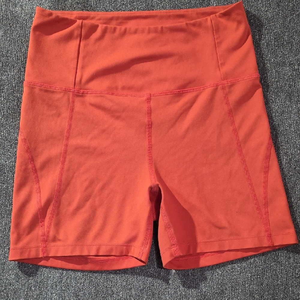 Girlfriend Collective High-Waisted Orange Bike Exercise Shorts